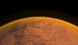 Mars' eerie red-orange surface glows in the darkness of space